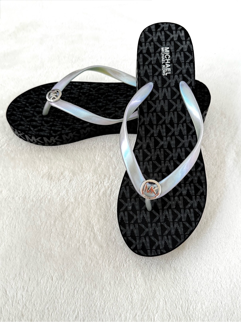 MICHAEL Michael Kors Wedge Flip Flops in Black Logo Print w/ Iridescent Straps